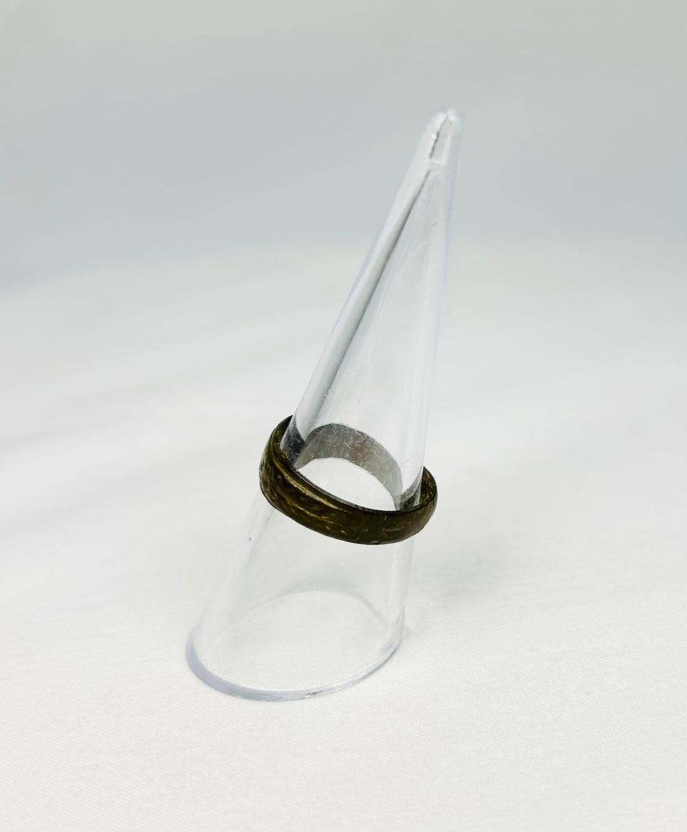 Historical Roman bronze ring with incised motifs around the circumference