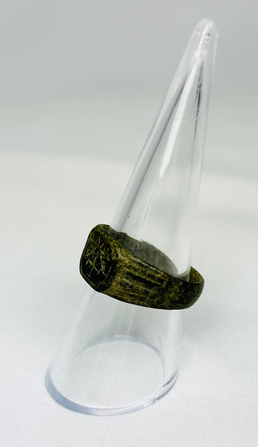 Side view of ancient Roman bronze ring, early Christian Chi-Rho symbol, 1st–4th Century CE, genuine antiquity from Relic and Rarity.