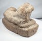 Terracotta reclining lion from ancient Egypt reflecting Egyptian and Hellenistic artistic fusion