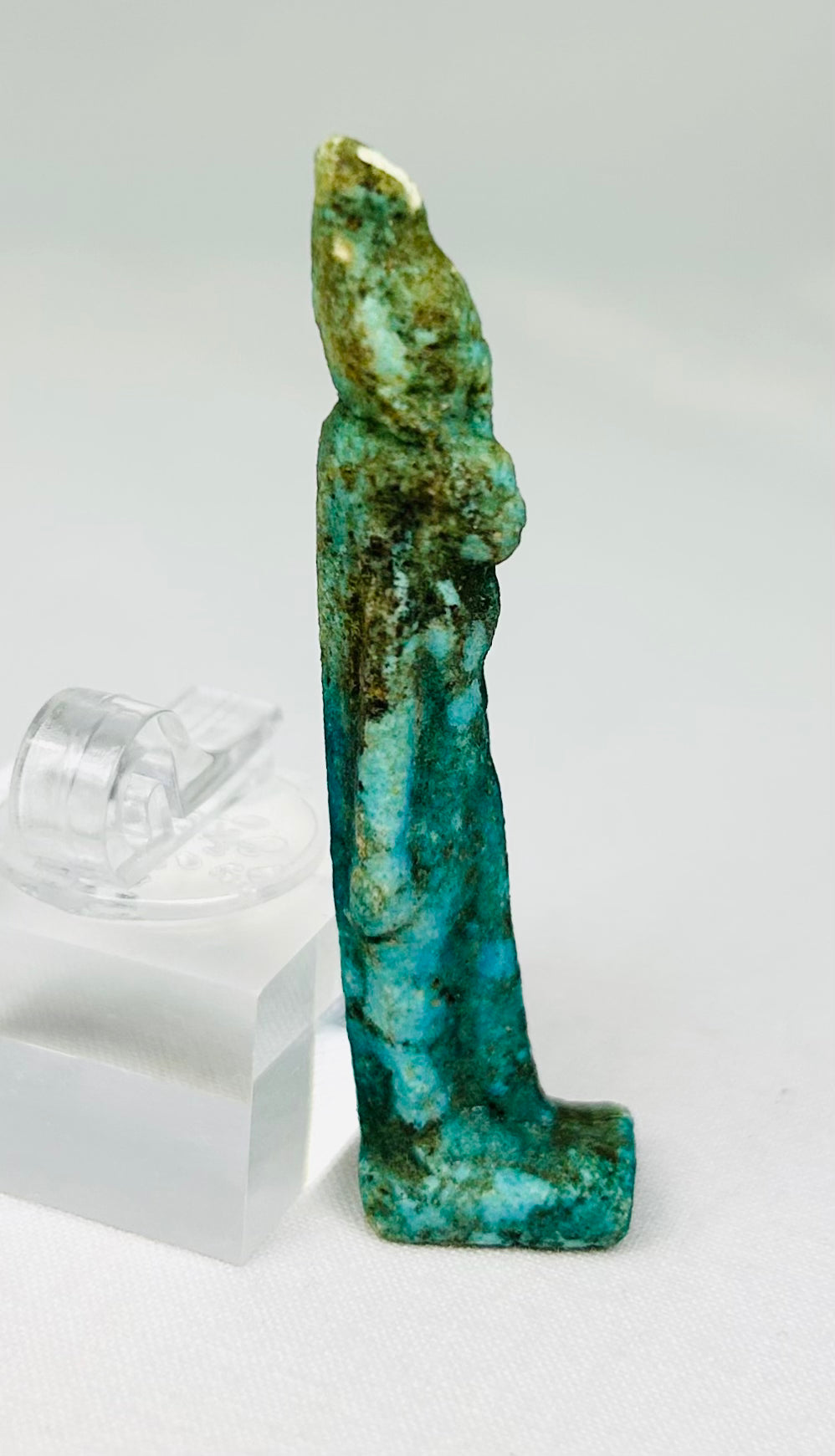 Turquoise-to-green-blue faience Sekhmet amulet showcasing fine Late Period craftsmanship