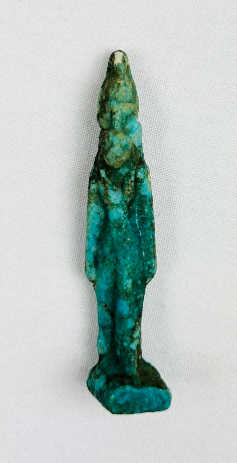Late Period Egyptian faience charm depicting lioness-headed goddess Sekhmet