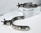 Antique American frontier spurs displaying Southwestern silversmithing influence