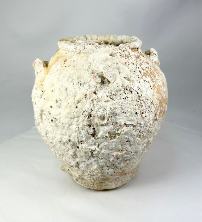 Marine-encrusted Song Dynasty terracotta jar salvaged from Southeast Asian waters, large rounded vessel for liquids or grains