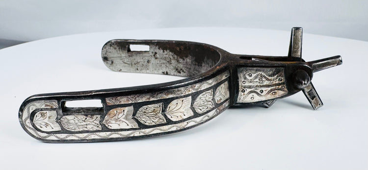 Pair of vintage cowboy spurs from the American West, circa 1900–1950