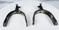 Historic Western equestrian spurs with engraved mounts and five-point rowels