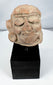 Weathered Pre-Columbian terracotta head fragment with burial accretions and surface patina