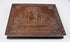Ornate thermoplastic photographic case with paired male and female ambrotype portraits