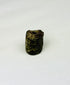 Egyptian stone bead amulet with symbolic snake engravings used as protective jewelry