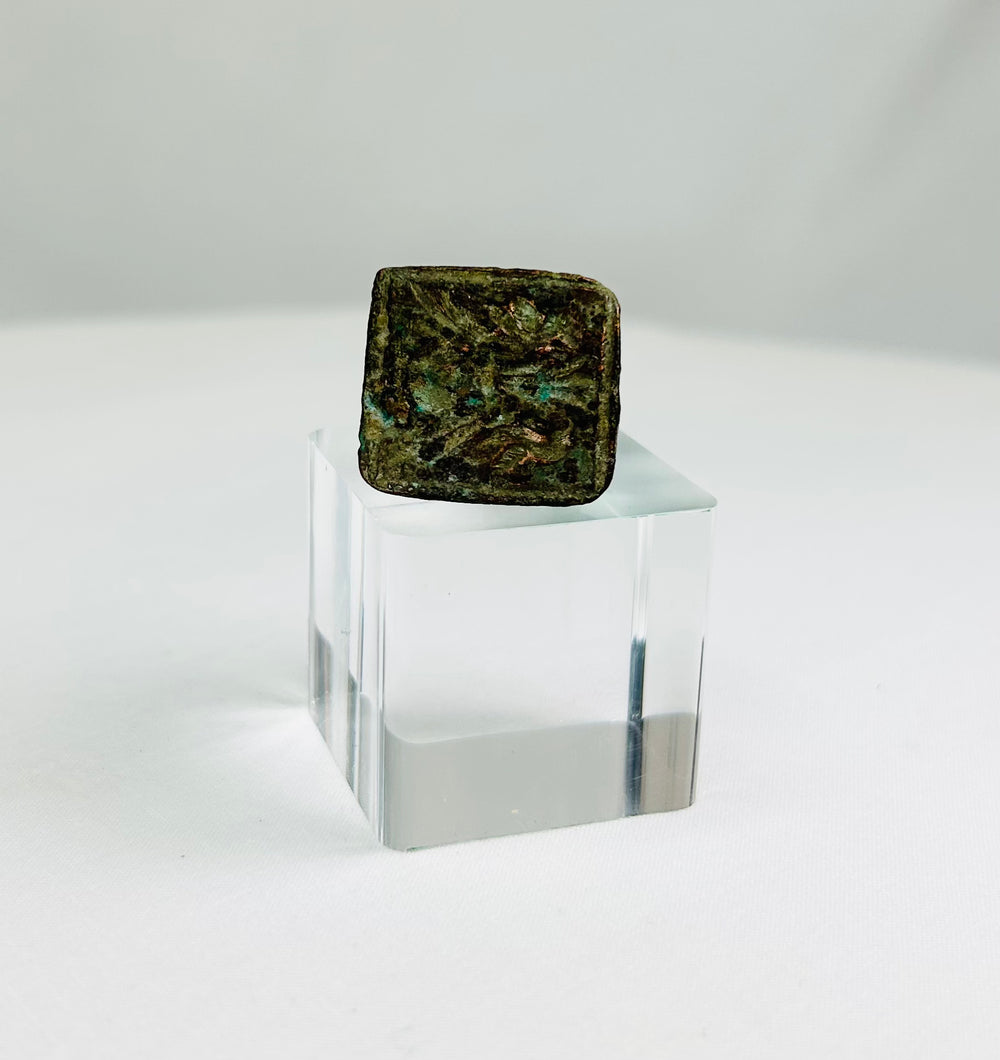 Early Roman or Near Eastern bronze ring featuring paired bird motif on square bezel