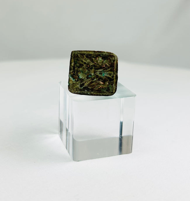 Early Roman or Near Eastern bronze ring featuring paired bird motif on square bezel