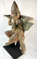 Bronze Garuda sculpture — left-side profile highlighting detailed carving