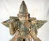 Sacred Garuda statue — detailed view of wings, ornaments, and pedestal base