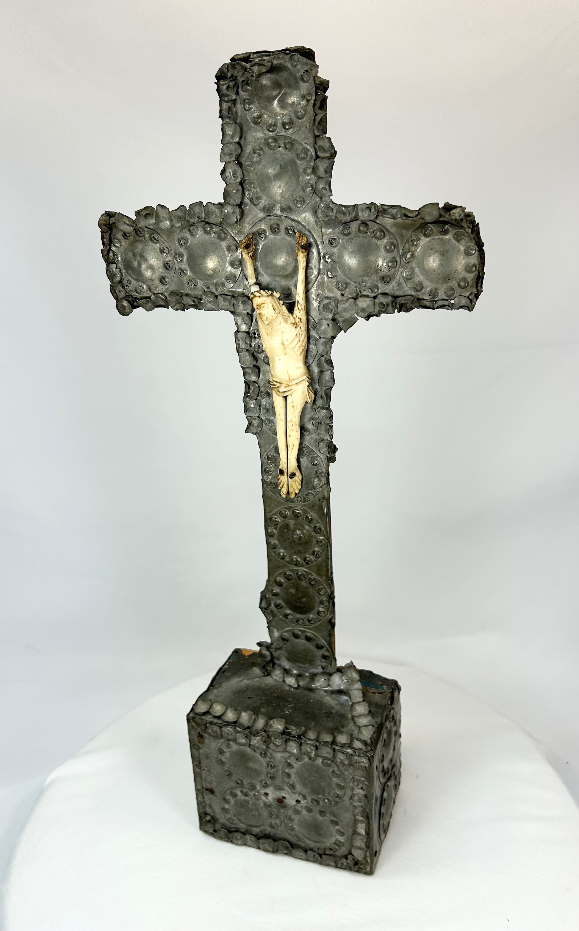 Bronze cross with gilded Christ — front-left angled view on white background