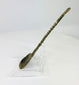 Left side profile of ancient bronze spoon highlighting elegant spiral handle design and encrusted surface texture.
