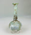 Ancient Roman glass bottle displaying elegant proportions, flared mouth, and iridescent sheen.