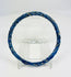 Ancient Roman glass bracelet photographed with visible iridescent sheen and smooth rounded edges.