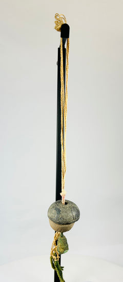 Detailed upper section showing twisted cord attachment and aged fiber condition