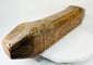 Close-up of antique wooden fish drum highlighting carved eye and mouth details with visible patina.