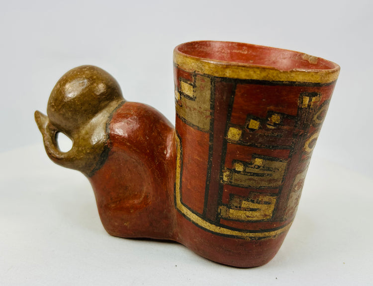 Ancient Nicoya effigy vessel with anthropomorphic head and geometric band in yellow, red, and black