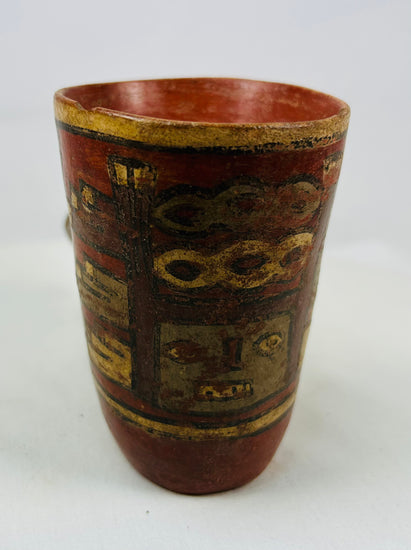 Tall Nicoya effigy vessel with red and ochre painted banding and stylized anthropomorphic head spout