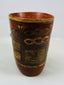 Tall Nicoya effigy vessel with red and ochre painted banding and stylized anthropomorphic head spout