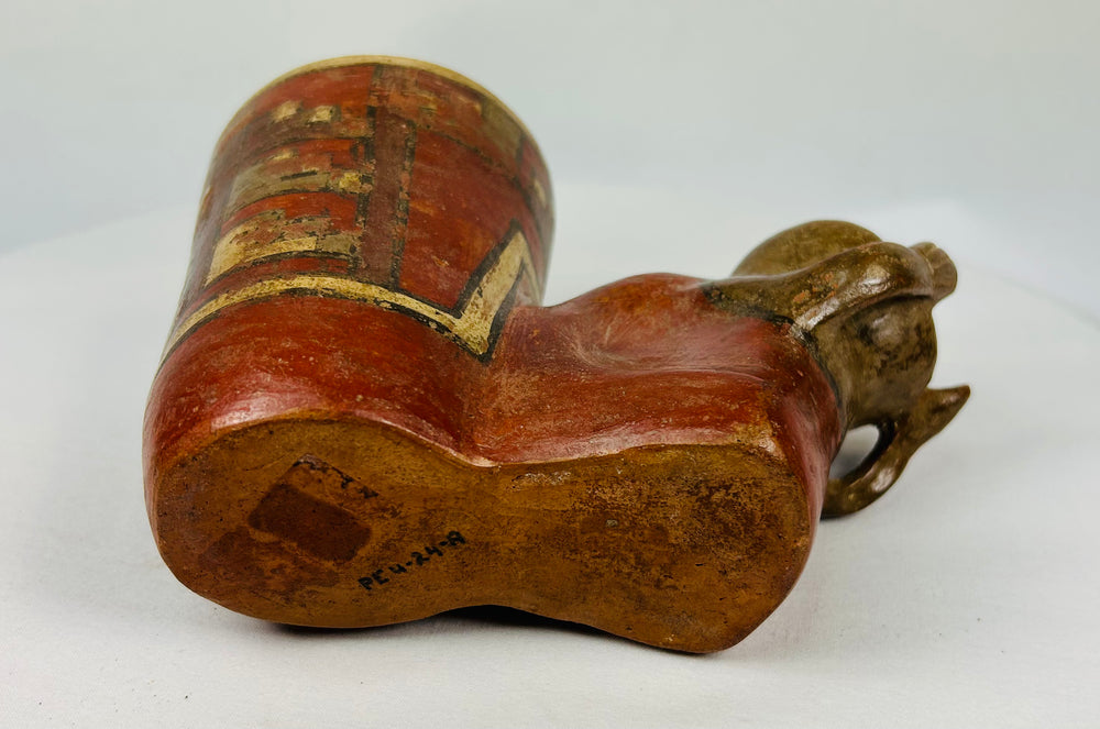 Rear view of ancient Nicoya effigy cup showing detailed geometric painting and red-brown slip finish