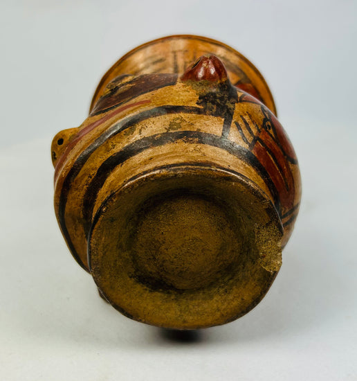 Underside of Guanacaste-Nicoya effigy vessel revealing handmade terracotta base and burial wear