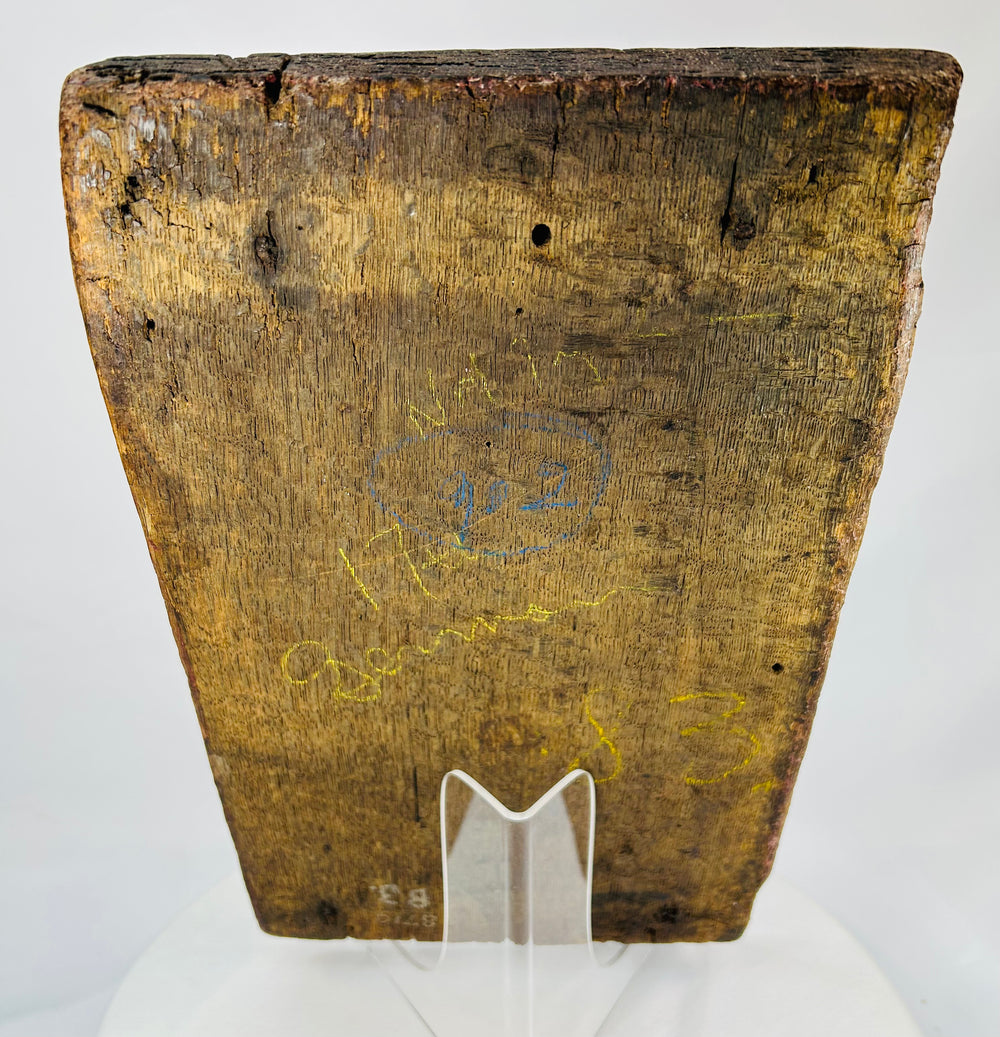 Reverse view of 16th-century oak panel showing early tool marks and aged wood grain.