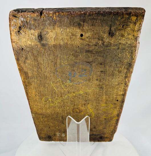 Reverse view of 16th-century oak panel showing early tool marks and aged wood grain.