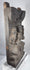 Indian religious carving with aged timber surface and projecting wooden tenons