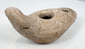 Ancient terracotta lighting vessel with intact reservoir and wick aperture