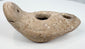 Ancient utilitarian oil lamp with handmade asymmetrical construction