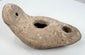 Archaeological terracotta oil lamp with pierced rear suspension lug