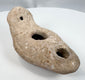 Late Antiquity earthenware oil lamp with central filling aperture