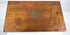Historic apothecary case containing clear and amber pharmaceutical bottles