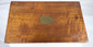 Historic apothecary case containing clear and amber pharmaceutical bottles