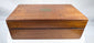 Antique wooden medical chest with hinged lid, keyhole and historic contents