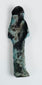 Ancient blue-green ushabti with simplified facial features and projecting feet