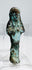 Late Period Egyptian funerary ushabti with crossed arms and headdress
