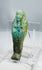 Ptolemaic Egyptian blue-green faience ushabti with crossed arms and tripartite wig