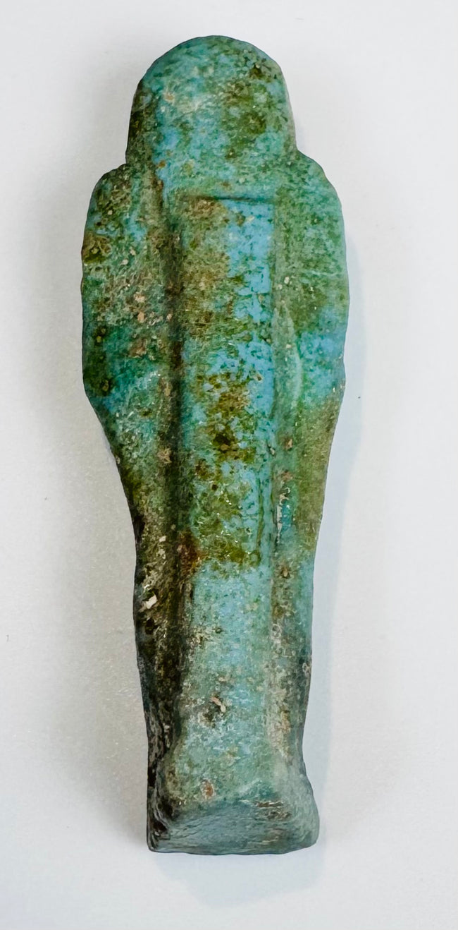 Egyptian funerary servant figure with hieroglyphs and natural burial encrustation