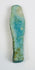 Egyptian funerary servant figure with weathered blue-green glaze