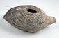 Ancient Holy Land terracotta lamp with central filling aperture and nozzle