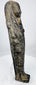 Side view of an ancient Egyptian carved stone ushabti showing its elongated mummiform profile