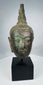 Sukhothai Period Buddha head with downcast eyes and elongated earlobes