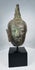 Antique Thai bronze head of Buddha Shakyamuni with natural green patina
