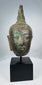 Antique Thai bronze head of Buddha Shakyamuni with natural green patina