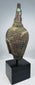 Fourteenth-century Thai Buddha head with almond-shaped eyes and arched brows
