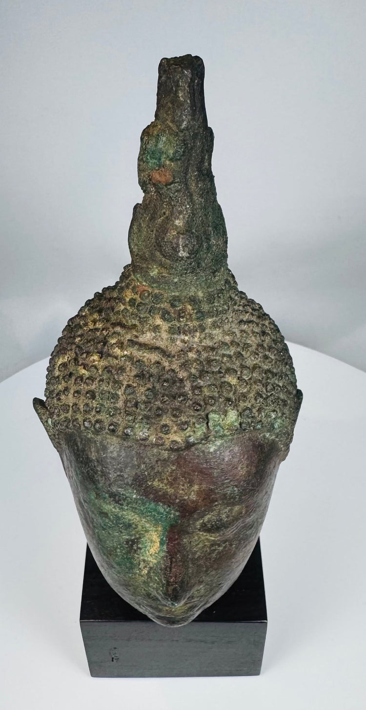 Museum-quality Sukhothai Buddha head dating to the 14th–15th century CE