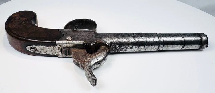 London-marked pocket pistol showing barrel proof and inspection marks